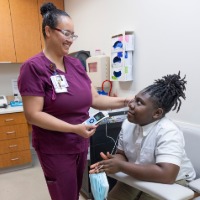 Teen receiving an auditory test at ULPS Clinic